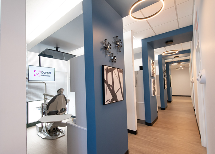 Hallway branching into dental treatment rooms