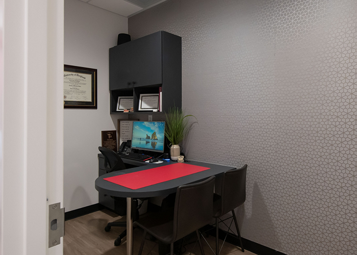 Black desk and cabinet in consultation room