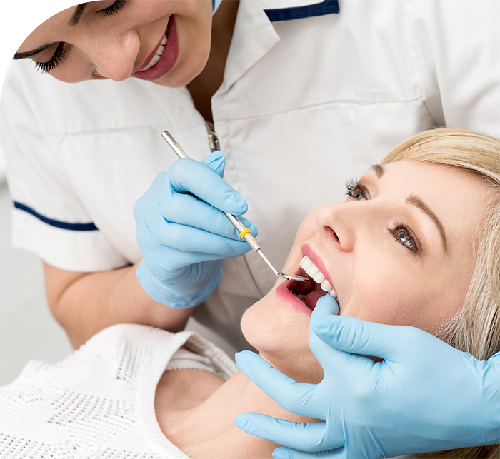 Woman receiving a preventive dentistry checkup