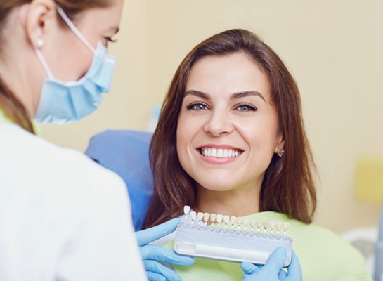 Woman grinning in dental chair